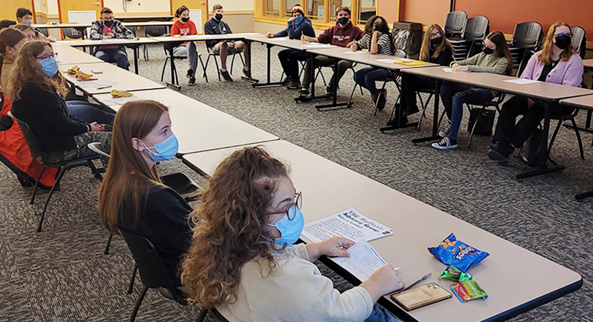 Group of TAG volunteers in a meeting