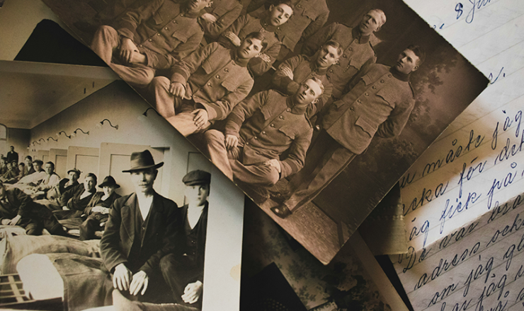 Old black and white photos with a handwritten letter on a desk